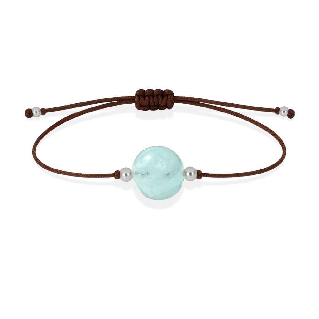 Pulsera de aguamarina natural con hilo marrón y balines en plata 925.