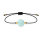 Pulsera de aguamarina natural con hilo negro y balines en oro de 18 quilates.