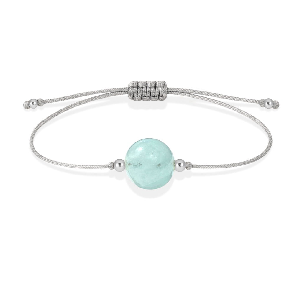 Pulsera de aguamarina natural con hilo plateado y balines en plata 925.