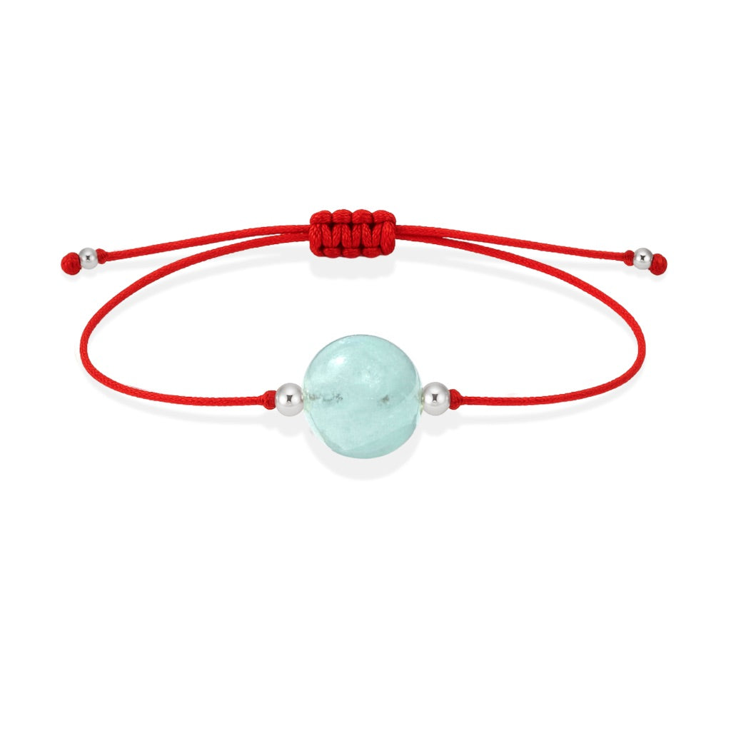 Pulsera de aguamarina natural con hilo rojo y balines en plata 925.