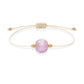 Pulsera de kunzita natural con hilo color hueso y balines en oro de 18 quilates.
