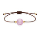 Pulsera de kunzita natural con hilo marrón y balines en oro de 18 quilates.