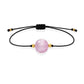 Pulsera de kunzita natural con hilo negro y balines en oro de 18 quilates.