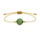 Pulsera de esmeralda natural con hilo dorado y balines en oro de 18 quilates.