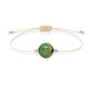 Pulsera de esmeralda natural con hilo color hueso y balines en plata 925.