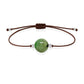 Pulsera de esmeralda natural con hilo marrón y balines en plata 925.