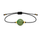 Pulsera de esmeralda natural con hilo negro y balines en oro de 18 quilates.