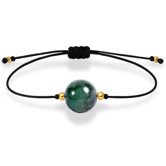 Pulsera de esmeralda natural con hilo negro y balines en oro de 18 quilates.