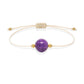 Pulsera de fosfosiderita natural con hilo color hueso y balines en oro de 18 quilates.