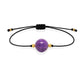 Pulsera de fosfosiderita natural con hilo negro y balines en oro de 18 quilates.