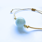 Vista lateral de la pulsera de Jade Maotiano – hecha a mano y ajustable