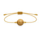 Pulsera de jaspe paisino natural con hilo dorado y balines en oro de 18 quilates.