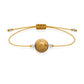 Pulsera de jaspe paisino natural con hilo dorado y balines en plata 925.