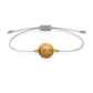 Pulsera de jaspe paisino natural con hilo plateado y balines en oro de 18 quilates.