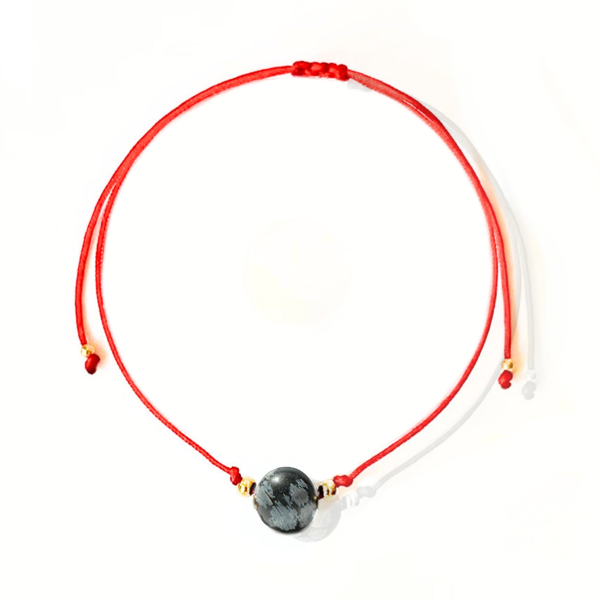 Vista superior de la pulsera de obsidiana nevada – diseño sobrio y equilibrado