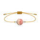 Pulsera de rodocrosita natural con hilo dorado y balines en plata 925.