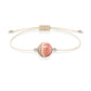Pulsera de rodocrosita natural con hilo color hueso y balines en plata 925.