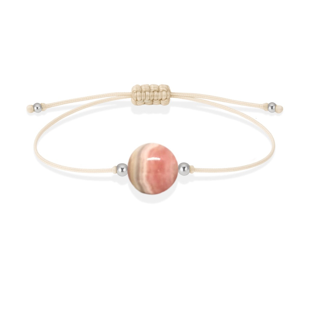 Pulsera de rodocrosita natural con hilo color hueso y balines en plata 925.