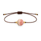 Pulsera de rodocrosita natural con hilo marrón y balines en oro de 18 quilates.