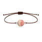 Pulsera de rodocrosita natural con hilo marrón y balines en plata 925.