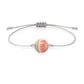 Pulsera de rodocrosita natural con hilo plateado y balines en plata 925.