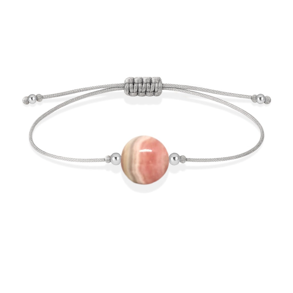 Pulsera de rodocrosita natural con hilo plateado y balines en plata 925.