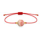 Pulsera de rodocrosita natural con hilo rojo y balines en oro de 18 quilates.
