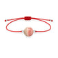 Pulsera de rodocrosita natural con hilo rojo y balines en plata 925.