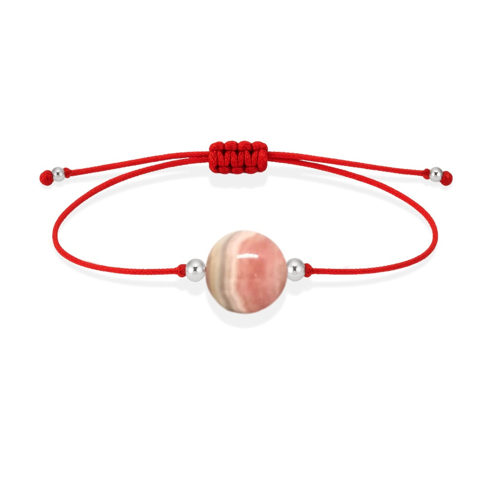 Pulsera de rodocrosita natural con hilo rojo y balines en plata 925.