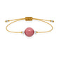 Pulsera de rodonita natural con hilo dorado y balines en plata 925.