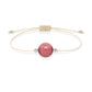 Pulsera de rodonita natural con hilo color hueso y balines en plata 925.
