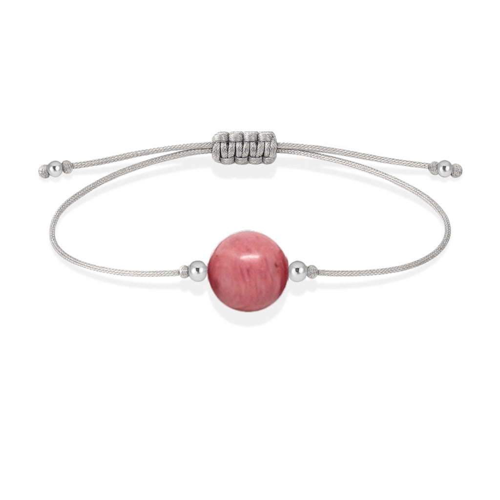 Pulsera de rodonita natural con hilo plateado y balines en plata 925.