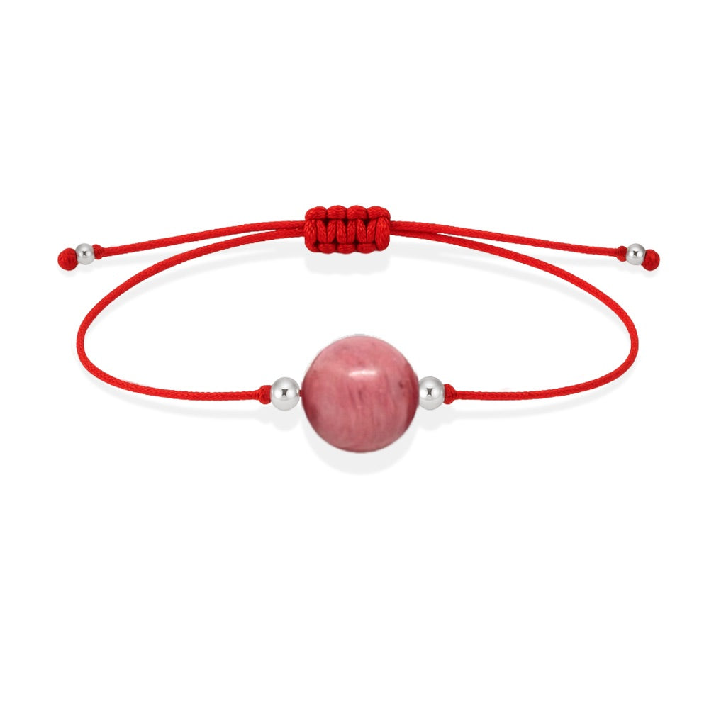 Pulsera de rodonita natural con hilo rojo y balines en plata 925.