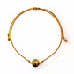Vista superior de pulsera de Unakita – diseño ajustable hecho a mano con balines en oro o plata